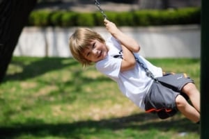 A kid on a swing